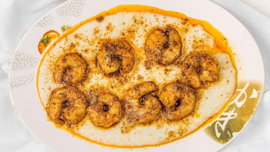 Shrimp And Grits · 8 jumbo shrimp seasoned with old bay served with grits.
