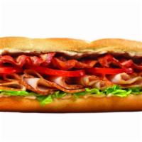 Turkey Club Large · Our all-white Turkey breast, topped with crisp bacon, lettuce, tomato & mayonnaise.