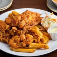 Fisherman'S Platter · colossal naked shrimp, sea scallops, local whitefish & calamari, served with french fries an...