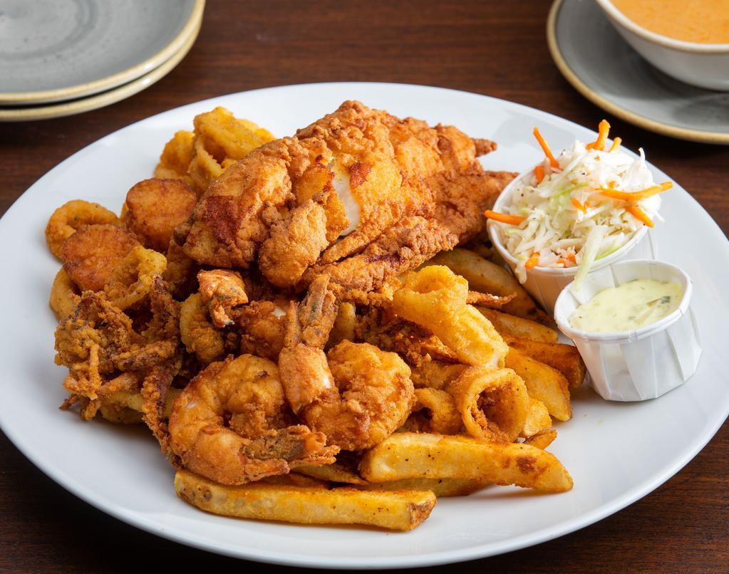 Fisherman'S Platter · colossal naked shrimp, sea scallops, local whitefish & calamari, served with french fries and coleslaw