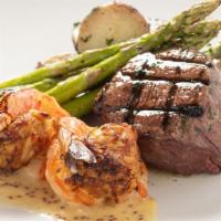 Surf & Turf* · Double R Ranch filet mignon*, simply grilled, butter roasted potatoes, green beans, and with...