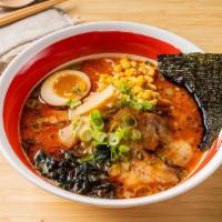 Spicy Miso Ramen · White miso based with minced pork, marinated soft boiled egg, green onions, corn and chashu.