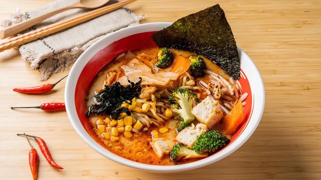 Spicy Vegetable Ramen · Creamy vegetable broth with corn, bamboo shoots, green onion, and fresh tofu. Served with umami vegetable spicy oil.