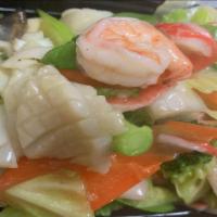 Seafood Delight · Crabmeat, jumbo shrimp and scallops with many kinds of fresh vegetables in tasty seafood sau...
