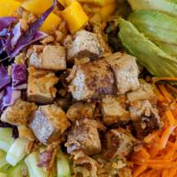 Tropical Tofu · Any base with grilled tofu marinated in Triple Citrus sauce. Topped with carrots, cucumber, ...