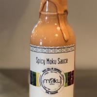 Hand Crafted Sauce Bottle · Our sauces are our own recipes and crafted in-house. 
Pictured: Spicy Moku - creamy, kicked ...