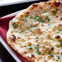 Garlic Naan · White flour bread with garlic and cilantro.