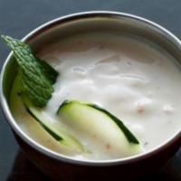 Raita (8 Oz.) · Savory yogurt preparation with carrot, cucumber, spices and black salt. 8 oz
