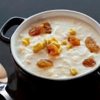 Rice Pudding · Creamy rice, cashews and golden raisins.