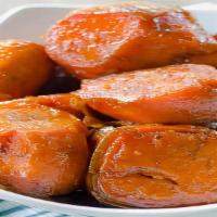 Candied Yams · Southern-style candied yams, glazed with brown sugar and cinnamon.
