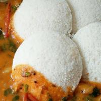 Idli Sambar · Vegetarian, gluten free. Steamed rice and lentil cakes served with vegetable puree and cocon...
