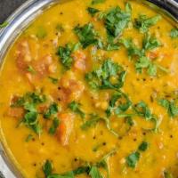 Daal Tadka · Vegetarian, gluten free. Protein rich split yellow lentils cooked with onion ginger and garl...