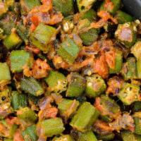 Bhindi Masala · Vegetarian, gluten free. Fresh okra sautéed in chopped tomatoes and onions with mild spices.