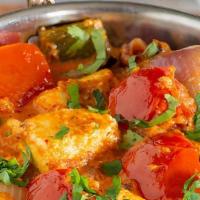 Kadai Paneer · Gluten free. Cubes of handmade Indian cheese, in an onion and bell peppers and tomato based ...