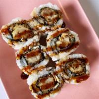 Shrimp Tempura Roll · Shrimp tempura, crispy bits, sweet soy sauce, sushi rice, nori.
