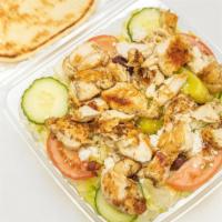 Grilled Chicken Salad · With lettuce, tomato, cucumber, green peppers, red cabbage, pepperoncini, pita bread and you...