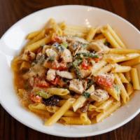 Penne Con Pollo · grilled chicken, shiitake mushrooms, asparagus, tomatoes, roasted garlic white wine sauce, p...