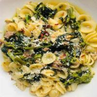 Orecchiette Con Salsiccia · Broccoli rabe, fennel sausage, garlic, chili flakes, pecorino