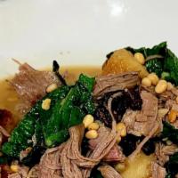 Housemade Potato Gnocchi · duck confit, dinosaur kale, zante currants, toasted pine nuts, roasted parmesan broth
