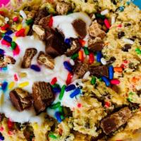 Funfetti Cookie Dough Sundae · Chocolate chip cookie dough, funfetti sprinkles, and whipped cream topped with crushed kit kat