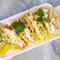 Special Chicken Tacos    · 4 tacos served in corn tortilla toped with lettuce, sour cream, and fresh fresco.