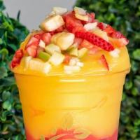 Fruit Bomb · Strawberry & mango smoothies layered with  strawberry, apple, and banana pieces on top.