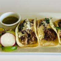 3 Tacos Pork · Each.  tacos with fresh  chopped onions, diced cilantro, fresh lime topped with queso fresco...