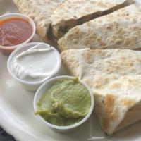 Quesadilla · Grilled flour tortilla stuffed with cheese, tomatoes, peppers, and onions. Served with guaca...