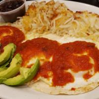 Huevos Rancheros · Three poached eggs, served on top of flour tortilla with homemade salsa, fresh avocado, Amer...