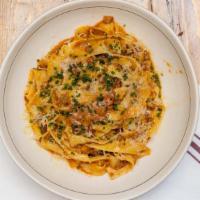 Tagliatelle · Egg pasta, pork bolognese, sage, parmesan
