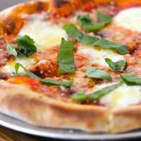 Margherita Pizza · Tomato, mozzarella, basil, extra virgin olive oil.