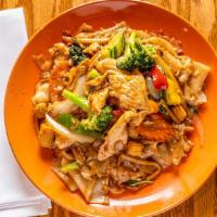 Crazy Noodle · Thai wide rice noodle stir-fried with chicken, egg, and mixed vegetables in spicy sauce.