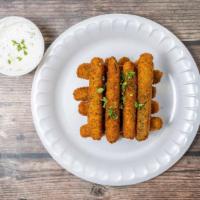 Zucchini Sticks · Breaded, lightly fried, and served with a side of tzatziki.