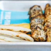 Naked Skewers · Served with 2 skewers. Tender cuts of grilled meat served with sliced lemon, a side of pita,...