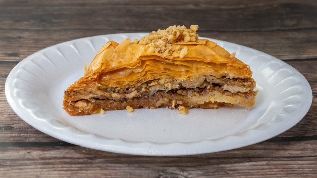 Baklava · Layered phyllo pastry with crushed walnuts and syrup.