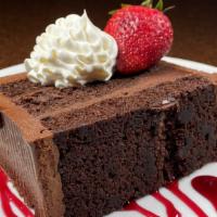 -Montilio'S- Chocolate Fudge Cake · multiple layers of rich dark chocolate cake, topped with layers of dark chocolate ganache