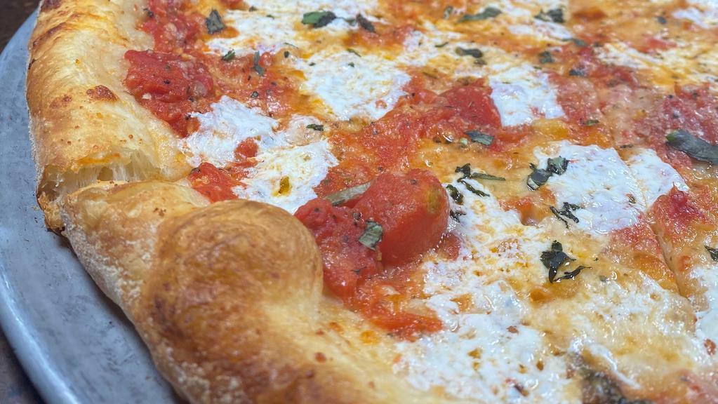Margherita Pizza · san marzano tomatoes, fresh mozzarella & fresh basil