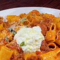 Pasta Bolognese · lean ground beef & pork slowly simmered with fresh herbs, garlic, wine and san marzano tomat...