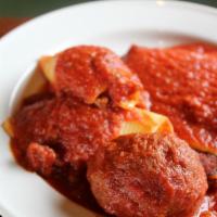 Trio 6 · chicken parm, stuffed shells, one meatball