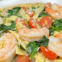 Shrimp Augustino · sauteed with garlic butter, fresh spinach, roasted grape tomatoes, lemon tossed with fettucc...