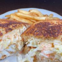 Cape Cod Reuben · fried haddock, topped with cole slaw, swiss cheese & thousand island dressing on grilled mul...