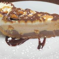 Reese’S ® Peanut Butter Pie · a popular candy bar in a pie! Milk chocolate & peanut butter mousse full of Reese’s peanut b...