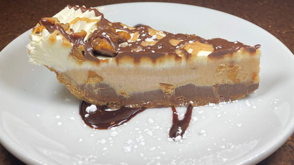 Reese’S ® Peanut Butter Pie · a popular candy bar in a pie! Milk chocolate & peanut butter mousse full of Reese’s peanut butter cups