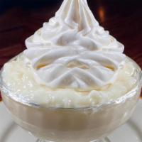 Tapioca Pudding · topped with whipped cream