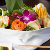 Chirashi Sushi · An assortment of sashimi on a bed of sushi rice.