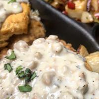 Chicken & Biscuit · 2 buttermilk biscuits topped with sausage gravy served with home-fries and 2 eggs.