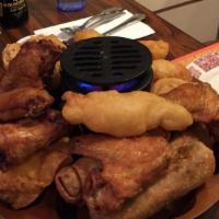 Pu Pu Platter · 4 chicken wings, 2 beef teriyaki, boneless spareribs, 2 egg rolls, 6 chicken fingers, 4 crab...