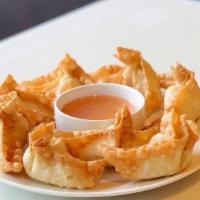 Crab Rangoon · Eight pieces. Crispy wonton with cream cheese vegetables and crab meat.