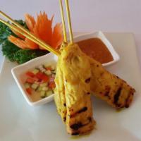 Chicken Or Beef Satay · Grilled marinated chicken or beef on skewers w/ peanut sauce & cucumber vinaigrette.