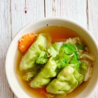 Dumpling Soup · Vegetarian. Vegetables dumplings w/ assorted vegetables in clear broth. Scallion and Cilantro.